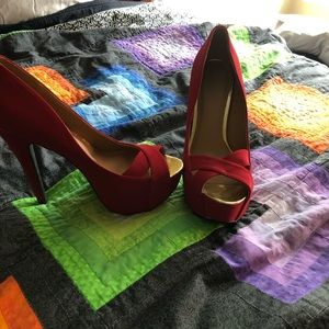 6 in red heels. Never worn